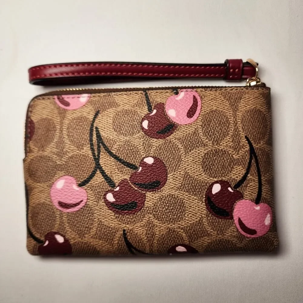 NWT Coach CZ450 Corner Zip Wristlet Signature Canvas Cherry Print Tan Multi v1 - Picture 2 of 3